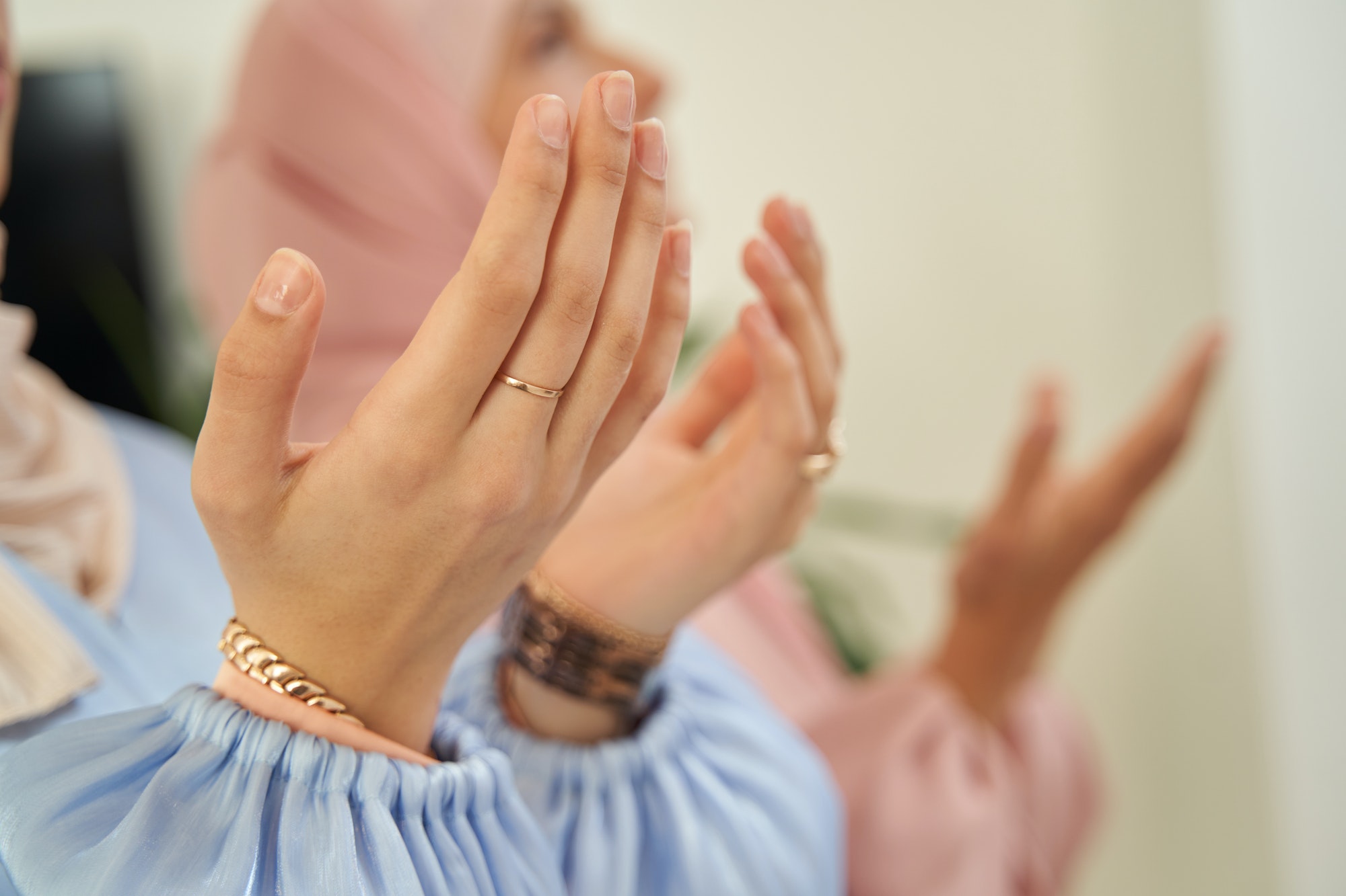 Cropped photot of Muslim female hands in religious prayer position