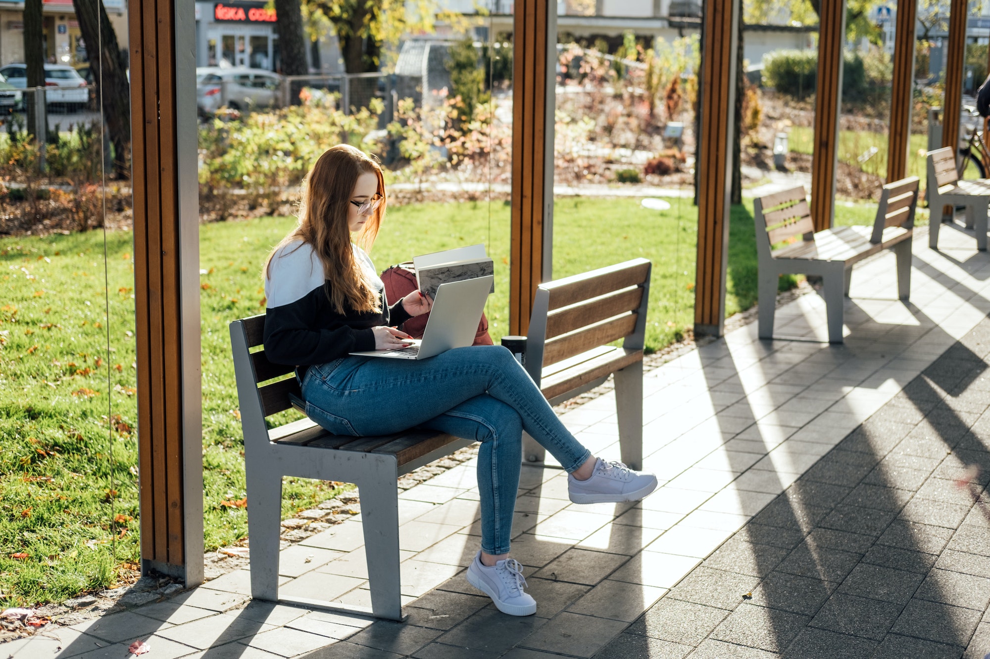 Managing Stress in High School. Stressed and tired student girl with laptop outdoors. Difficult